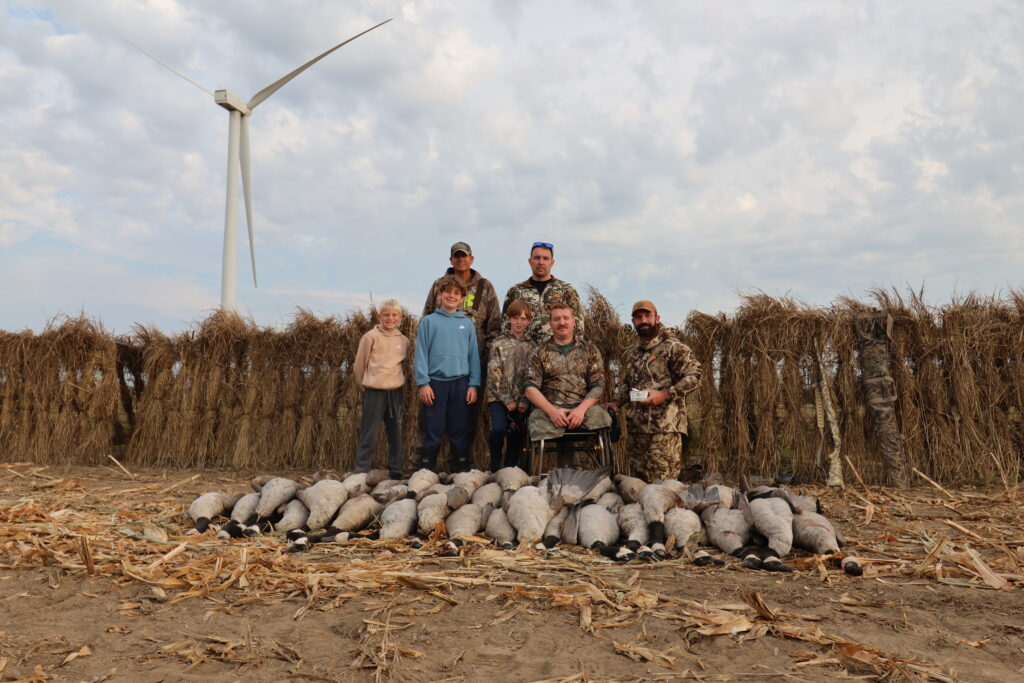 hunters with geese